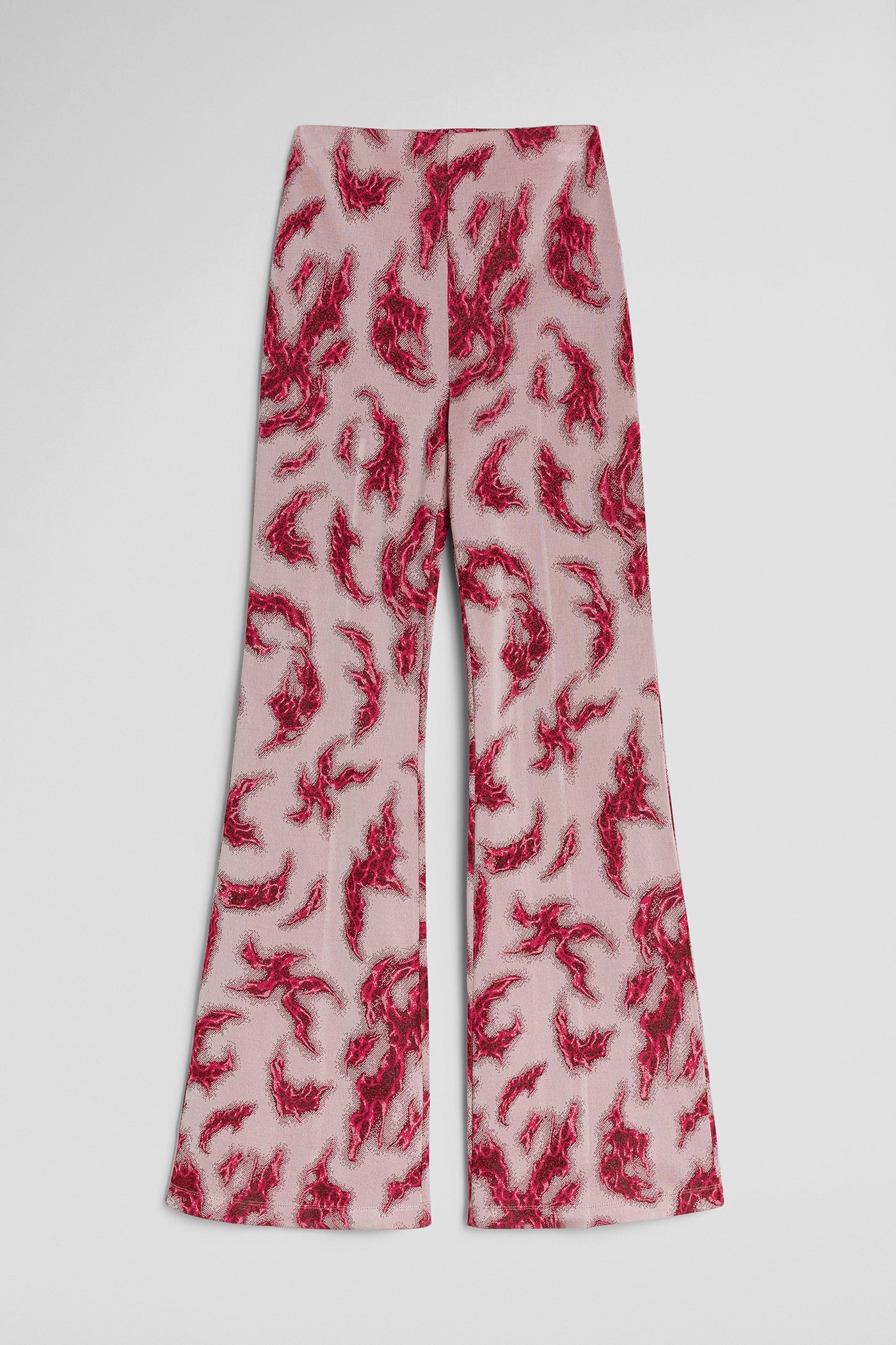 Flared pants with red abstract pattern on a white background